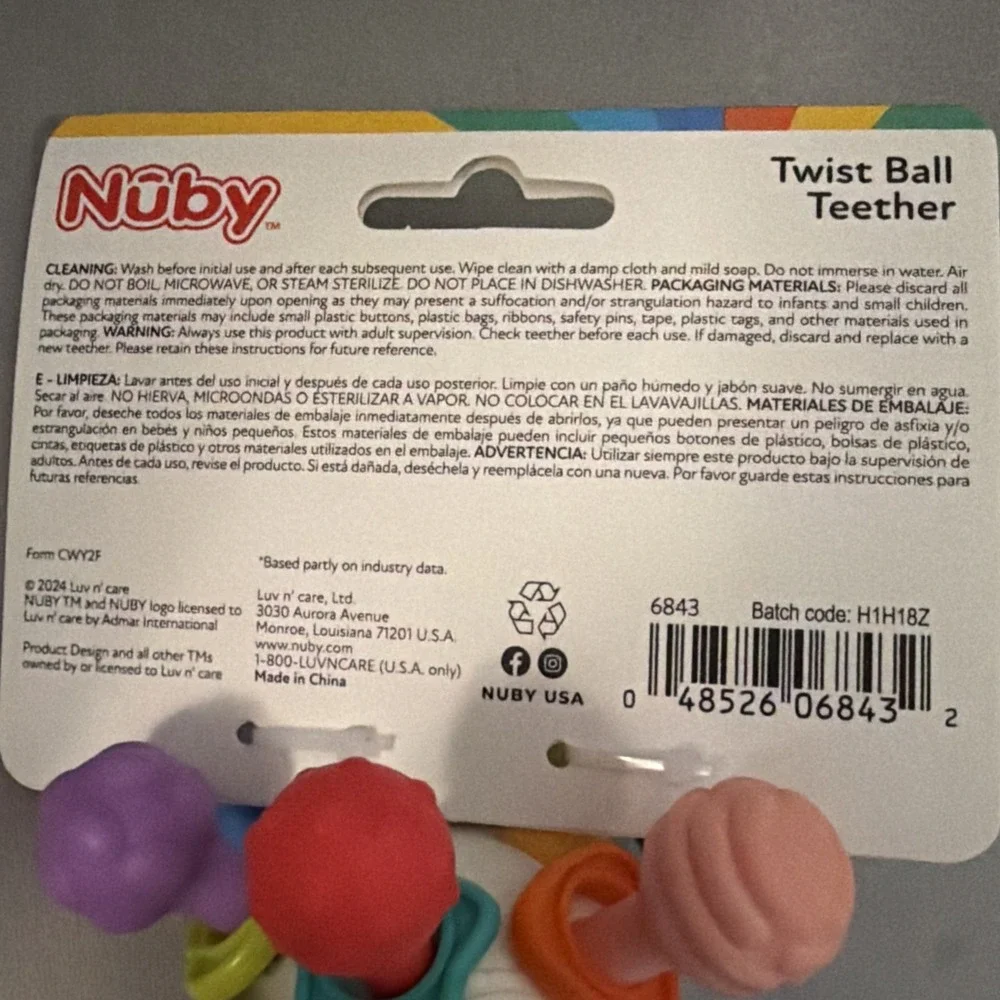 Nuby Textured Twist Ball Baby Teether Toy with Colorful Rattle